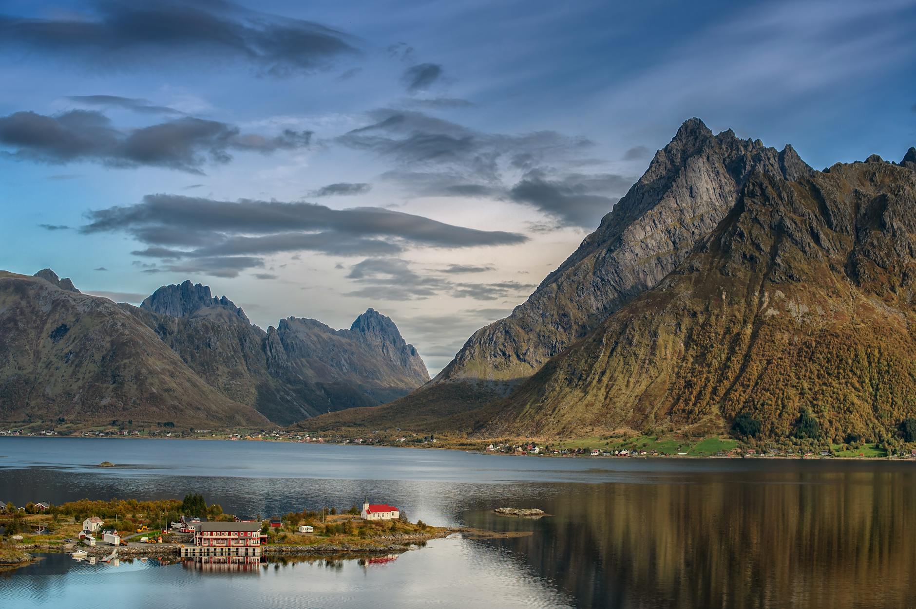 a beautiful landscape with mountains and a small town