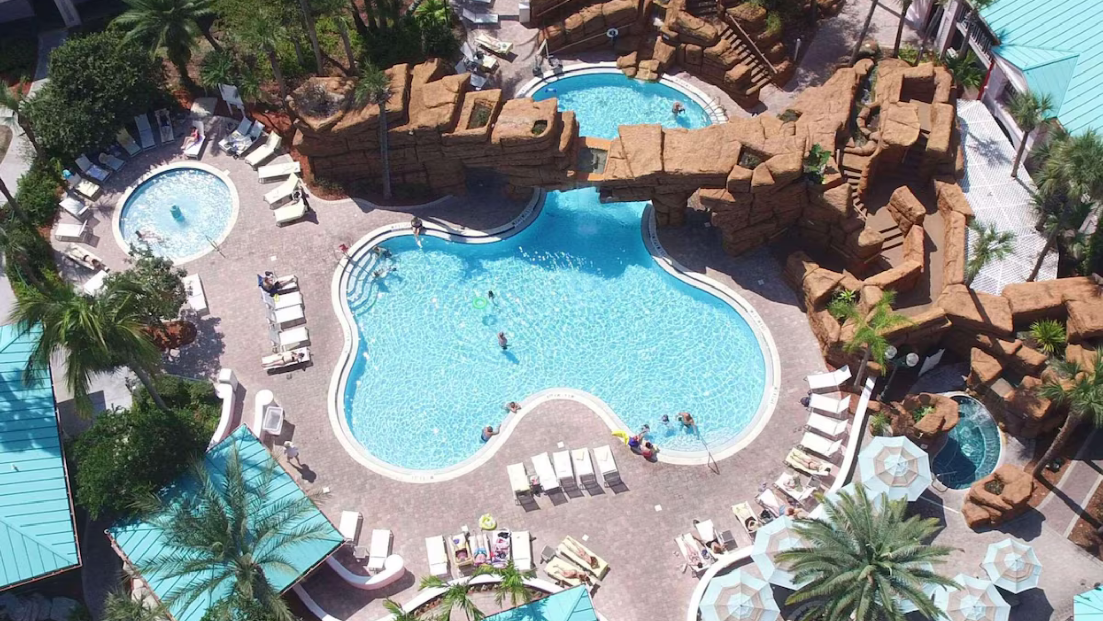 Radisson Resort at the Port pool with palm trees