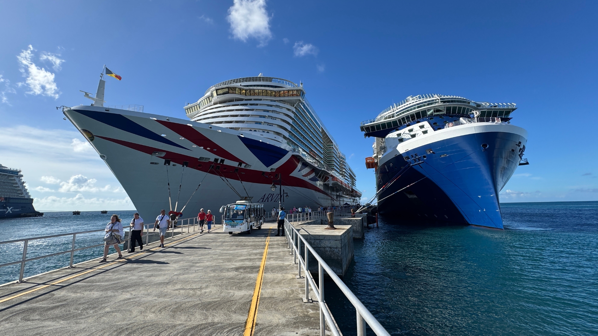 white ship on sea during sunset